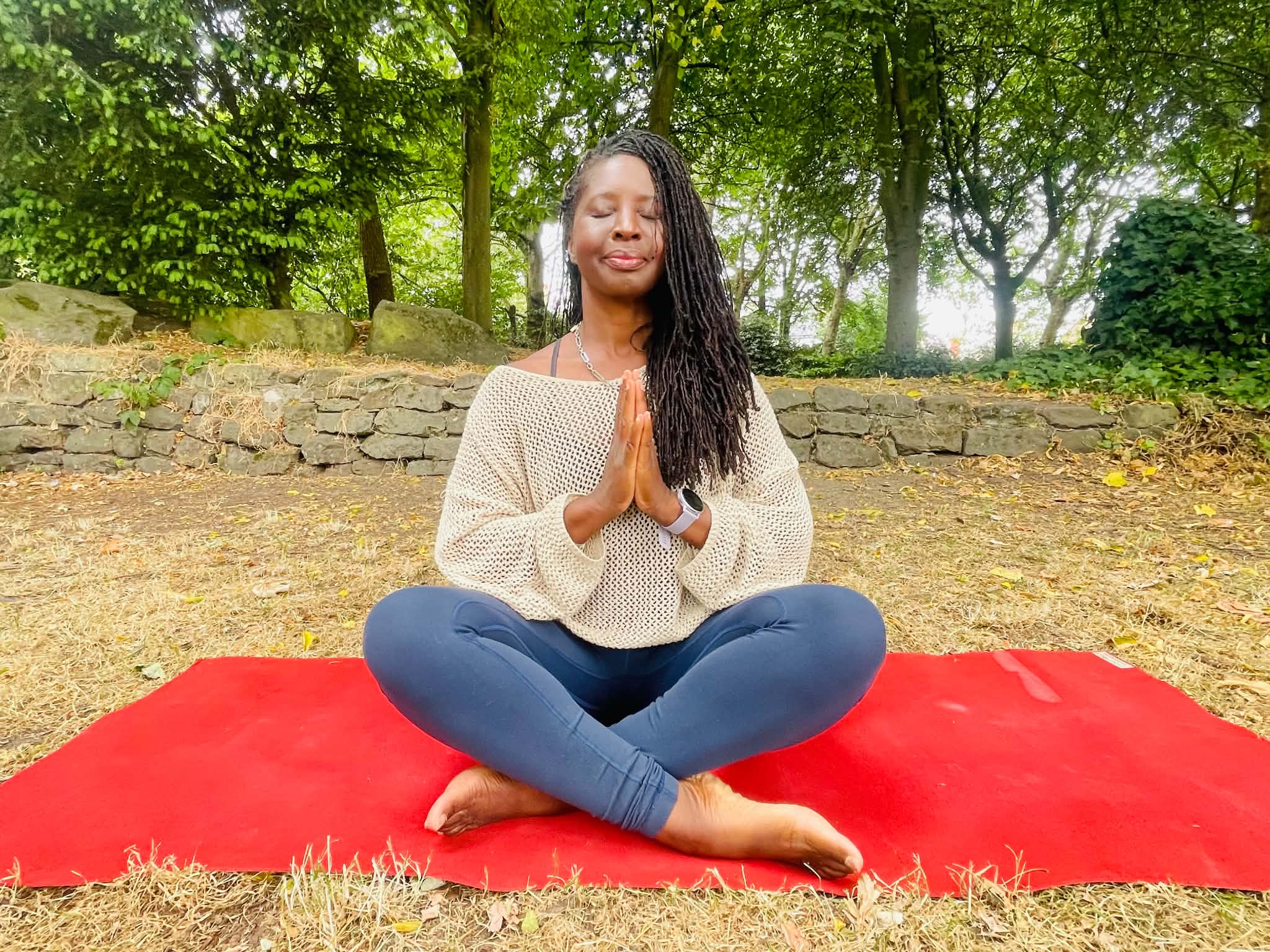 Dionne meditating outdoors