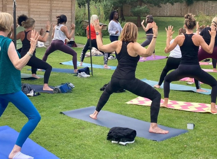 A group yoga session outdoors