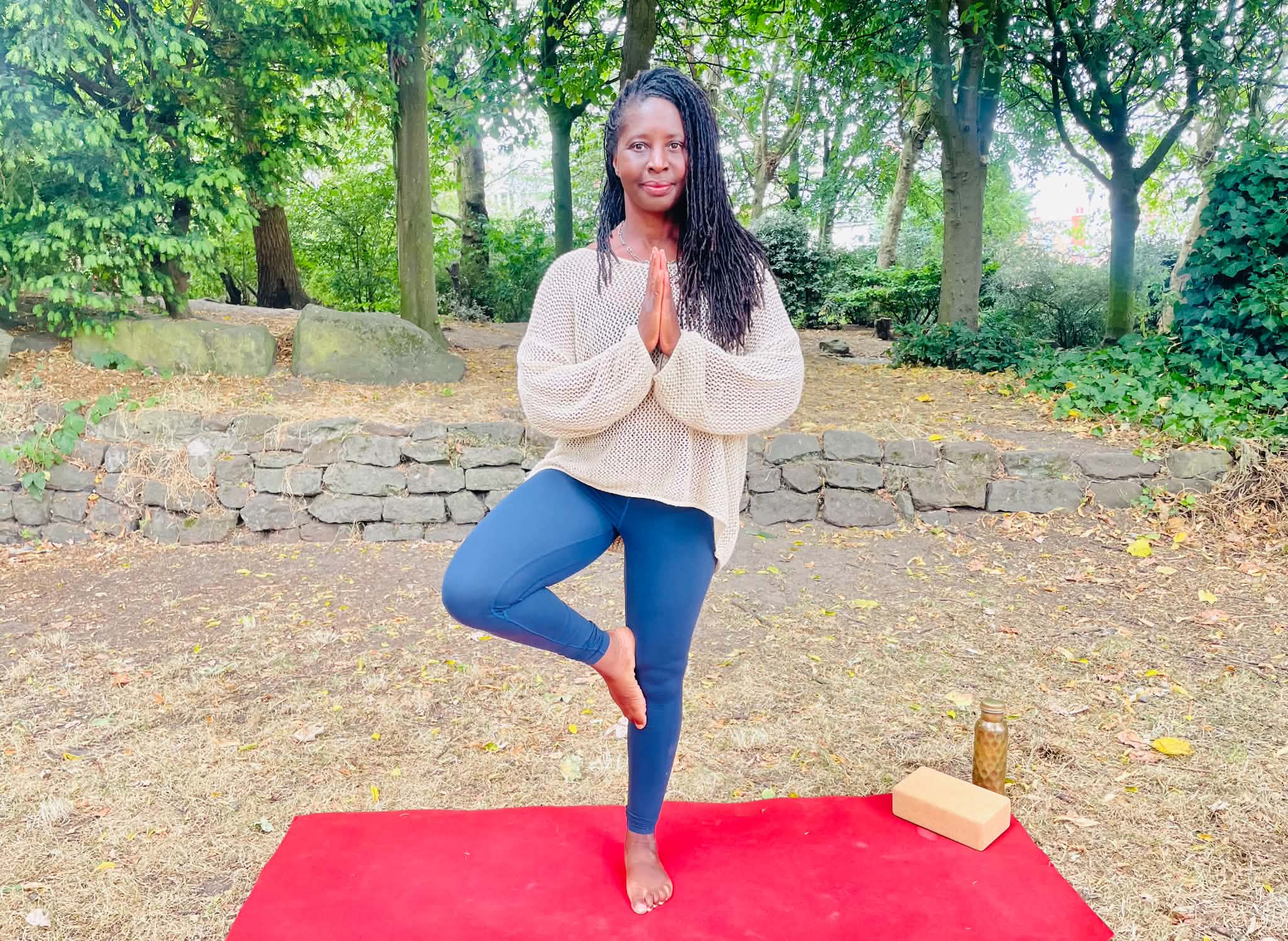 Dionne practising yoga outdoors