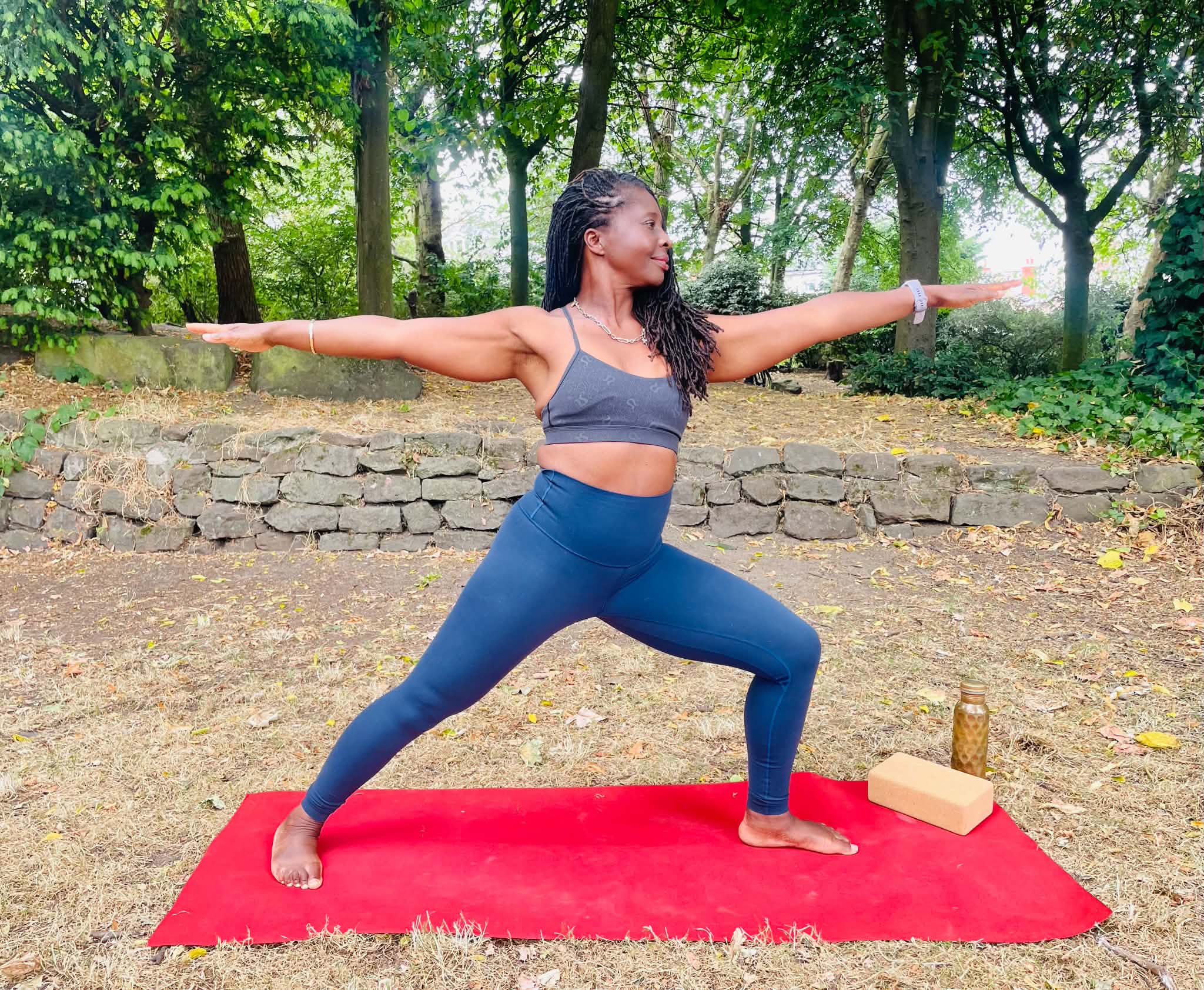 Dionne in a standing yoga pose outdoors